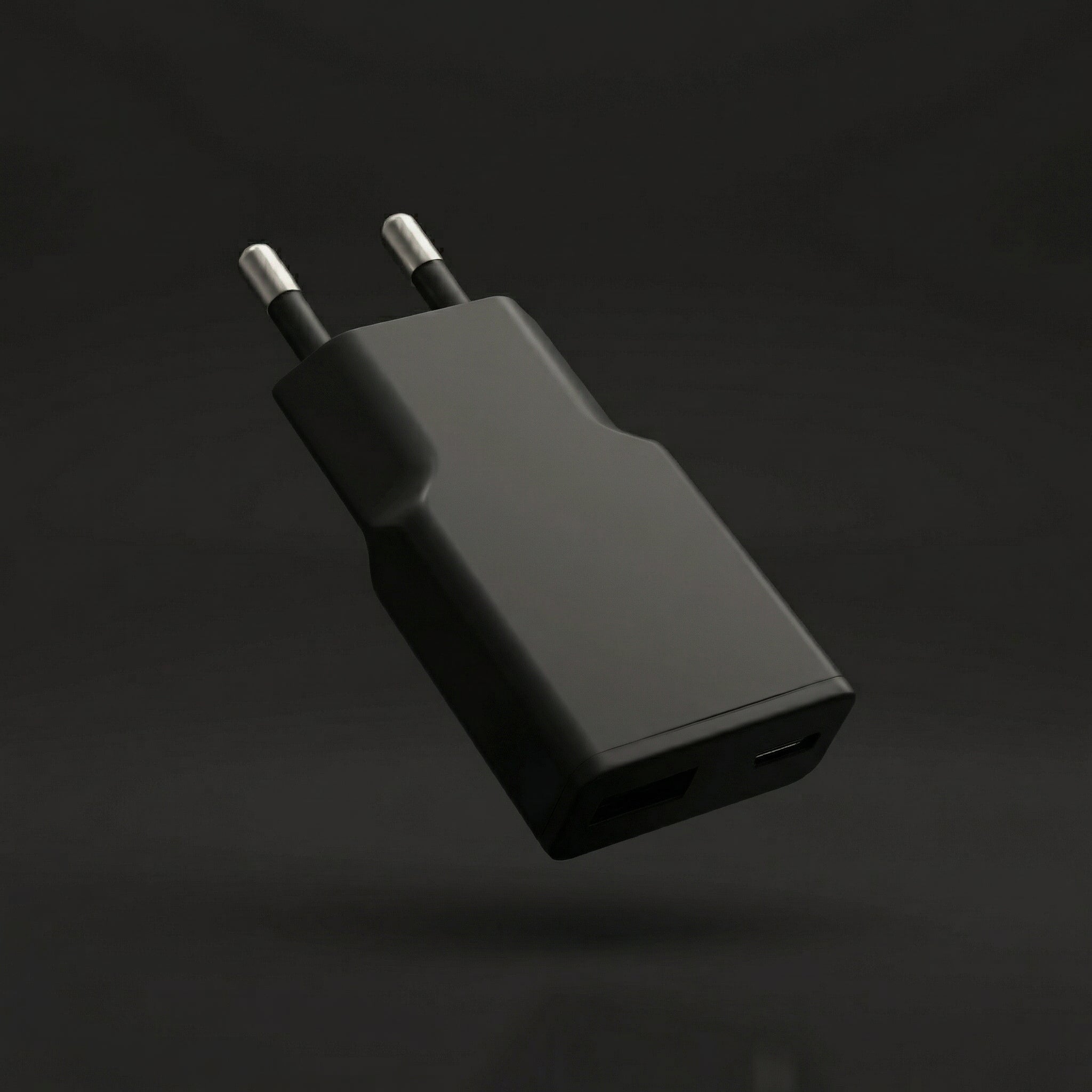 Svart laddare med USB-A och USB-C